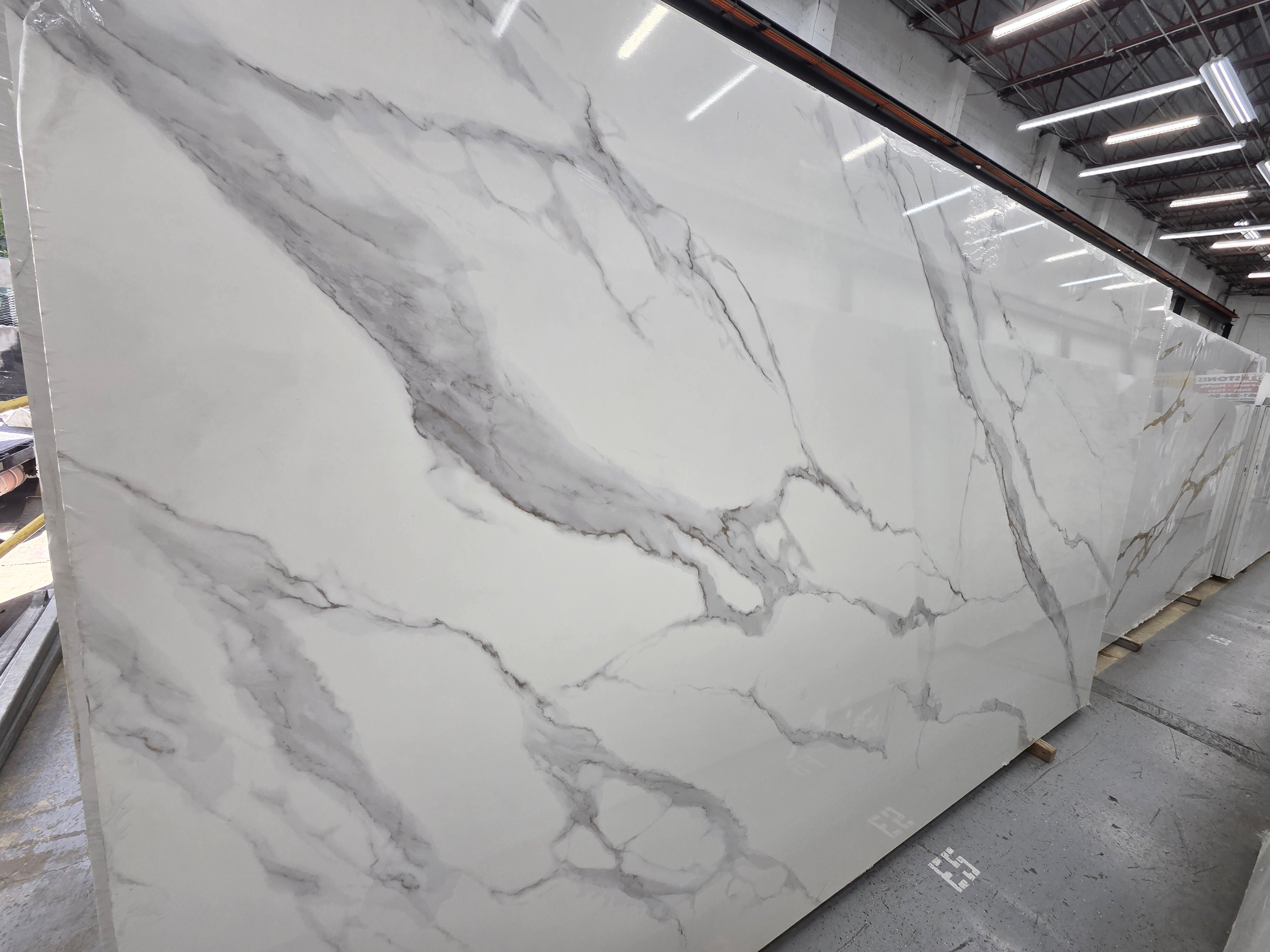 Quartz slab with gray veining