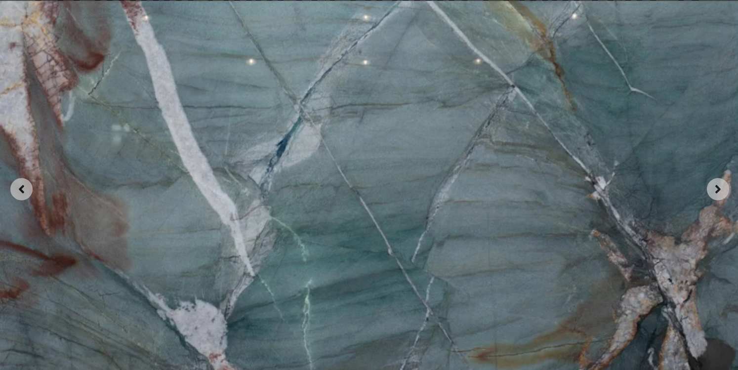 Arturo Blu quartzite slab with blue-green tones, white veining, and natural gold and rust accents
